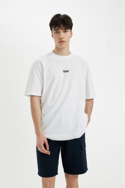 تيشيرت أوفر سايز نص ردن بياخة مستديرة بطبعة من الخلف