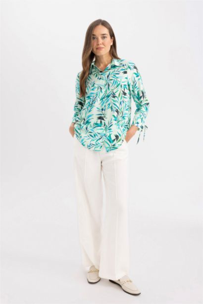 قميص ردن طويل قصة عادية منقوش