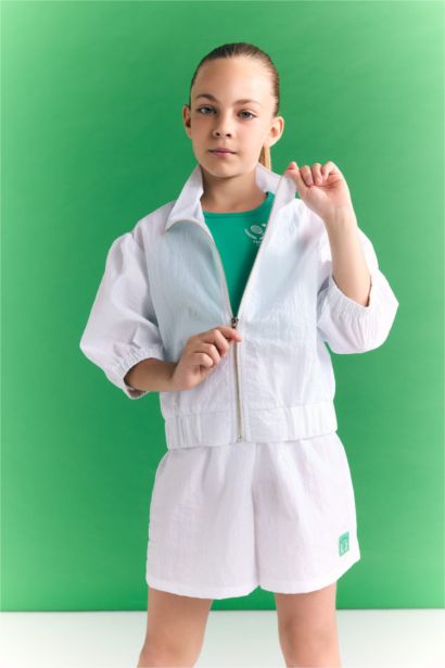 سويت شيرت رياضي بناتي بسوستة وياقة عالية