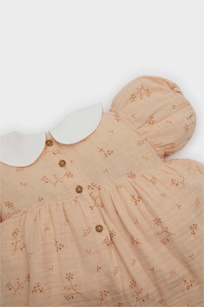 Combinaison fleurie pour bébé fille