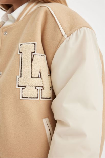 جاكيت بومبر بناتي بجيب وسوسته وياقة كوليج