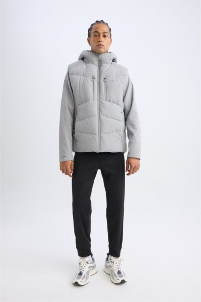 DeFactoFit جاكيت بامب وتر بروف قصة عادية بكابيشون مقاوم للهواء من