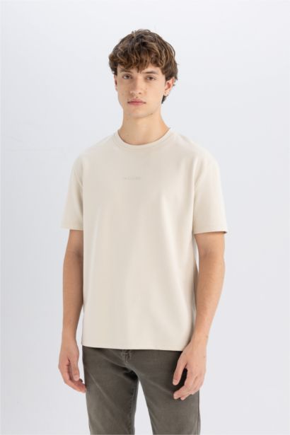 تيشيرت مطبوع قصة عادية بياخة مستديرة