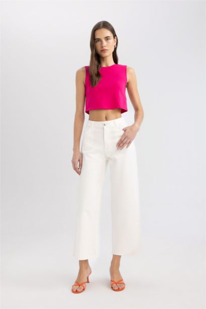 كروب توب سادة بدون ردن بياخة مستديرة