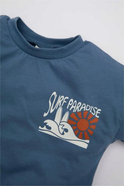 طقم بيبي اولادي بطبعة شعار قصة عادية من قطعتين