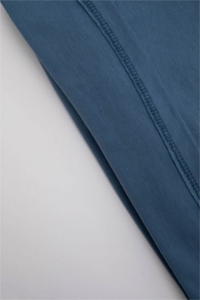 طقم بيبي اولادي بطبعة شعار قصة عادية من قطعتين