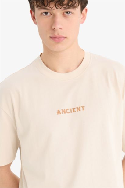 T-shirt oversize en coton imprimé au dos à col rond et manches courtes