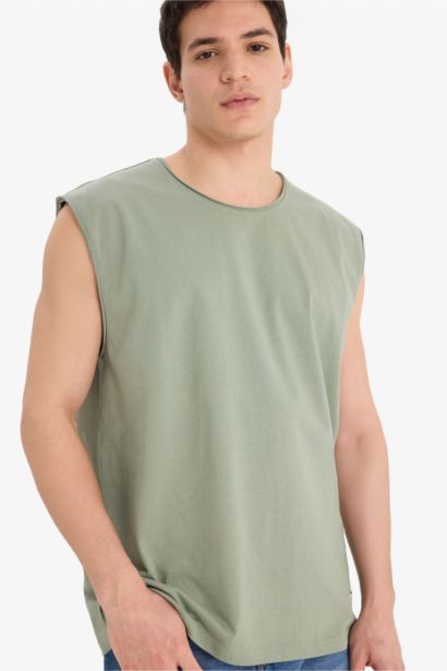 تانك قطن توب أوفر سايز برقبة مستديرة بدون كم أخضر فاتح