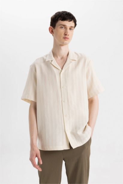 قميص بولو نص كم قصة مريحة برقبة جاكيت