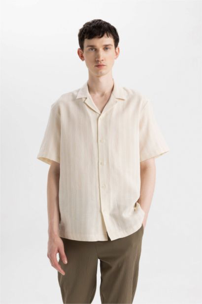 قميص بولو نص كم قصة مريحة برقبة جاكيت