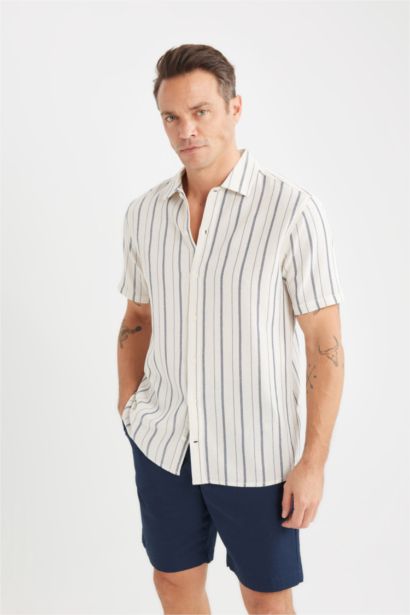 قميص بولو مخطط نص كم قطن مطبوع قصة عادية