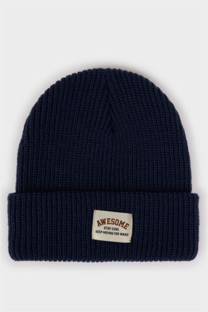 Bonnet en tricot avec étiquette tissée pour garçon