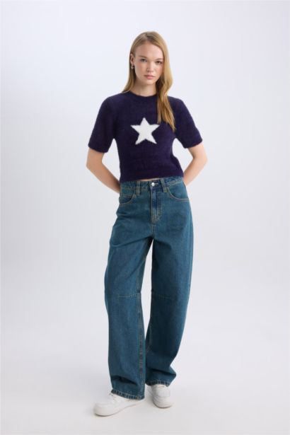 بلوفر تريكو سليم فيت برقبة مستديرة بطبعة نجم