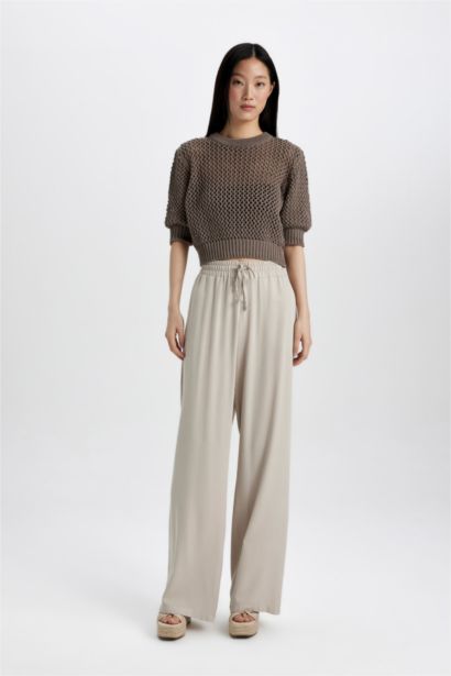 بلوزة كروشيه قصة عادية بياخة مستديرة