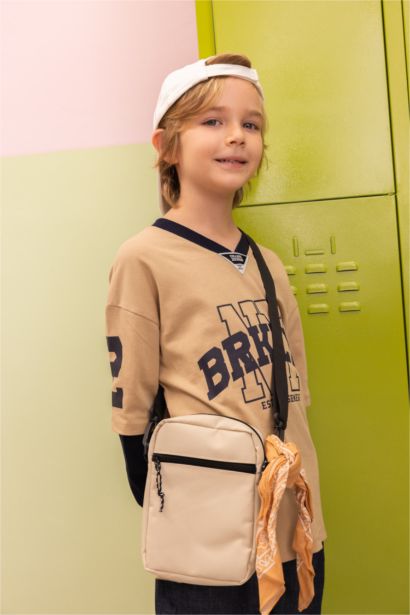 T-shirt Oversize à manches longues et col V avec texte imprimé