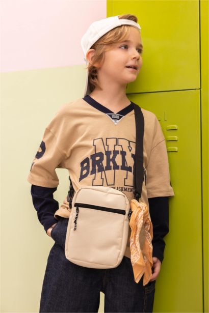 T-shirt Oversize à manches longues et col V avec texte imprimé