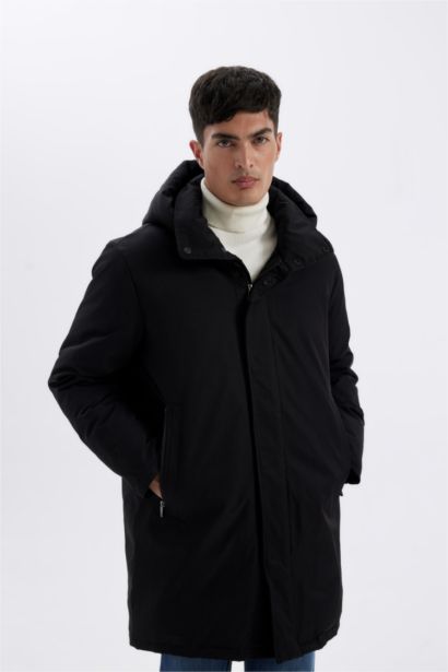 قمصلة نفخ اسود طويل قصة عادية بغطاء للرأس مقاوم للماء