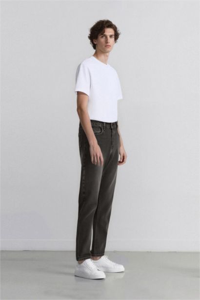 سروال جينز 90’S سليم فيت بساق ضيق