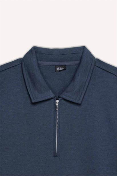 سويت شيرت قصة عادية بياقة بولو بسوسته