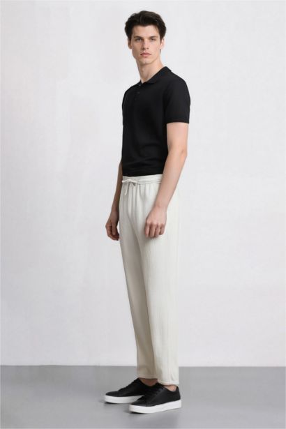 Брюки-джоггеры летние приталенные с карманами