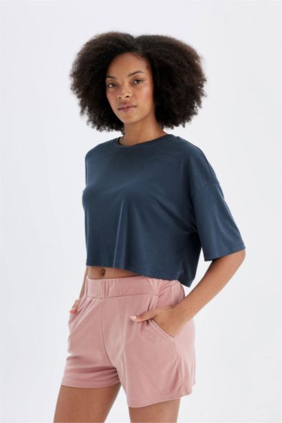 شورت رياضي قصير بينك من DeFactoFit