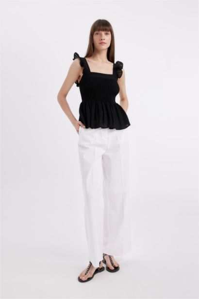 بلوزة اسود بدون ردن بحمالات وياخة مربعة