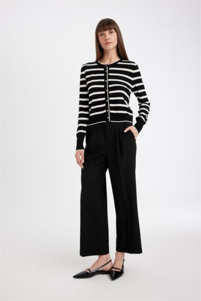 جاكيت تريكو مخطط قصة عادية بياخة مستديرة