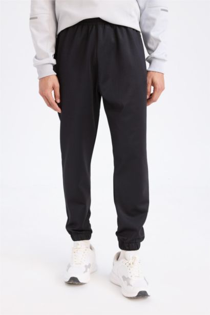 Standart Fit Sporcu Jogger Eşofman Altı Cepli Beli Paçası Lastikli