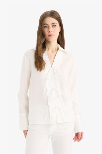 قميص ردن طويل نسيج مشروط قصة عادية بياقة مدورة