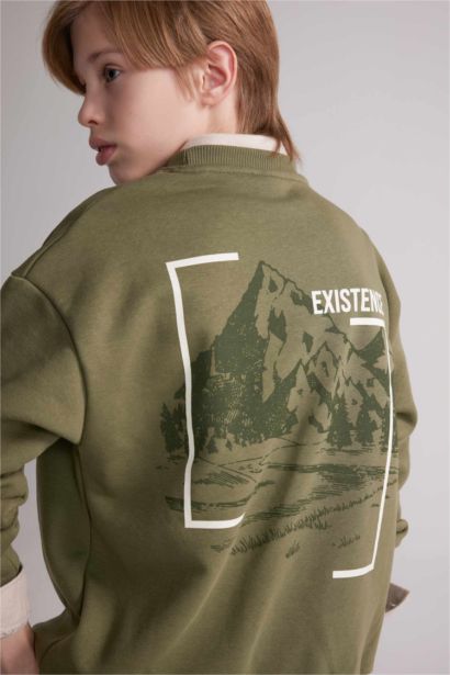 سويت شيرت واسع برقبة مستديرة