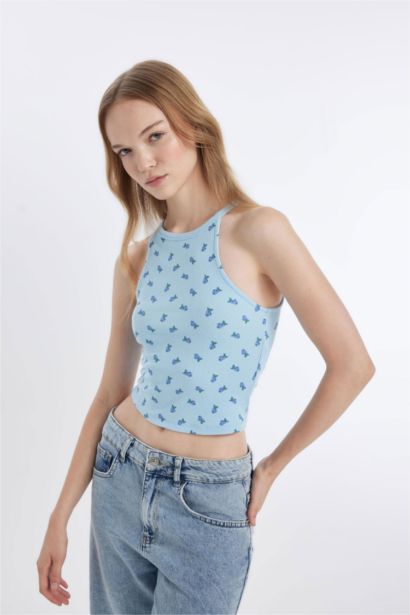 تانك توب مضلع سليم فيت بطبعة فاكهة وياقة هالتر