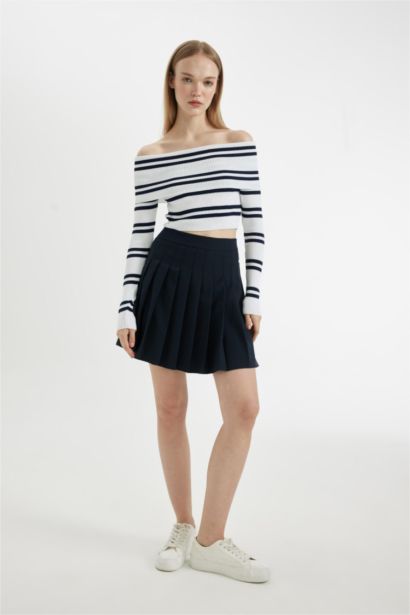 Mini Jupe plissée à taille haute