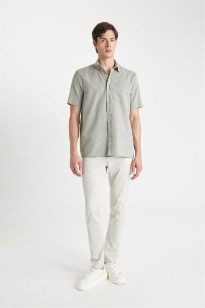 قميص بولو كتان نص كم قصة عادية