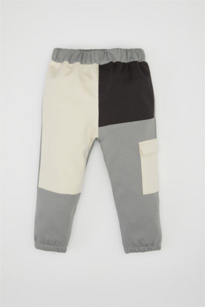 طقم بيبي اولادي هودي وسويت بانتس بطبعة شعار قصة عادية - قطعتين