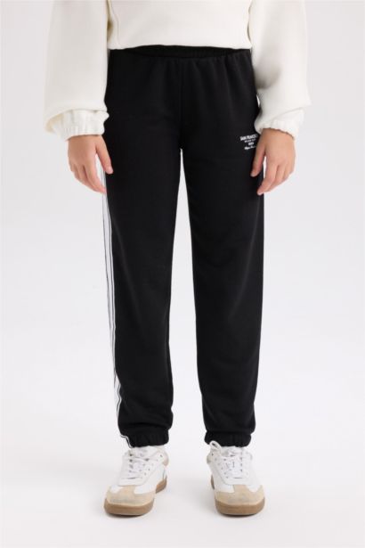 Jogging noir imprimé à taille élastique pour Fille