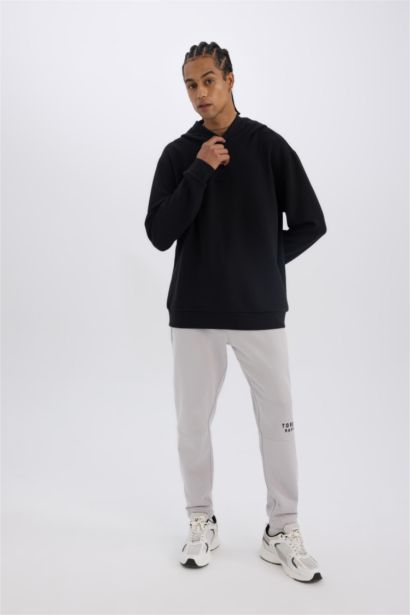 بنطلون سويت بانتس جوجر تقيل قصة عادية من DeFactoFit