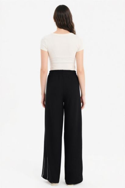 سروال قصة مستقيمة برجل عادي