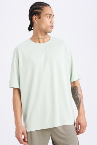 تيشيرت رياضي نص كم أوفر سايز من DeFactoFit