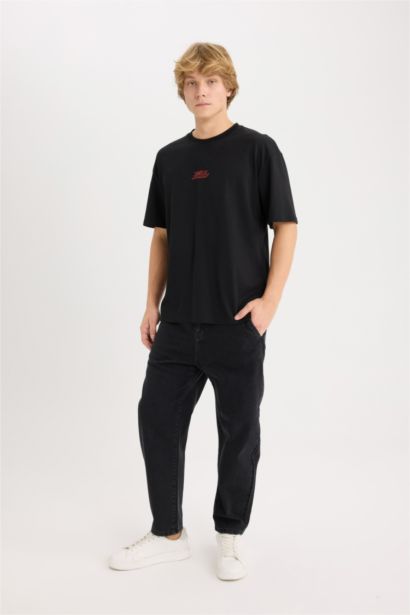 T-shirt boxy en coton imprimé au dos à col rond