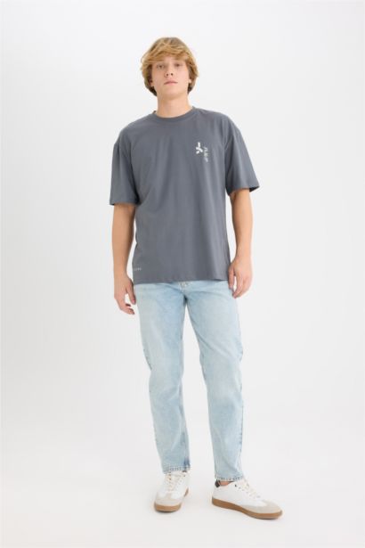 T-shirt boxy en coton à imprimé Marvel au dos à col rond