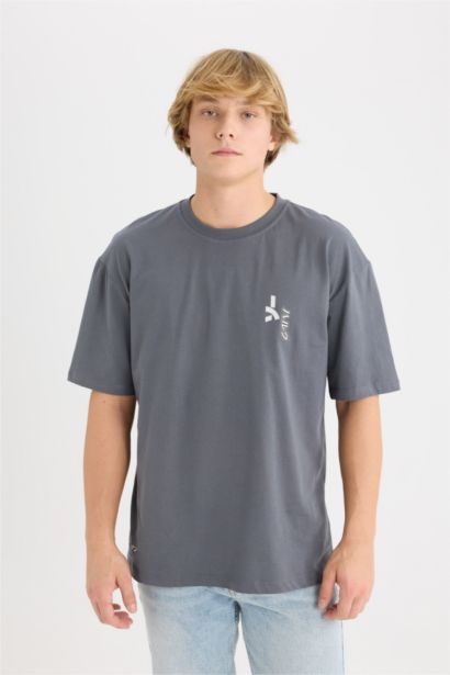 T-shirt boxy en coton à imprimé Marvel au dos à col rond