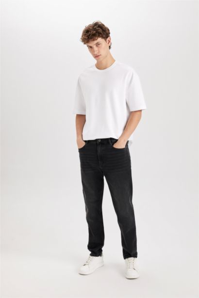 بنطلون جينز 90’S سليم فيت برجل ضيقة