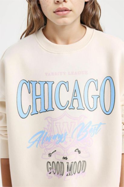 Sweatshirt imprimé à col rond et coupe relax pour fille