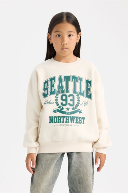 سويت شيرت قصة مريحة بياخة مستديرة