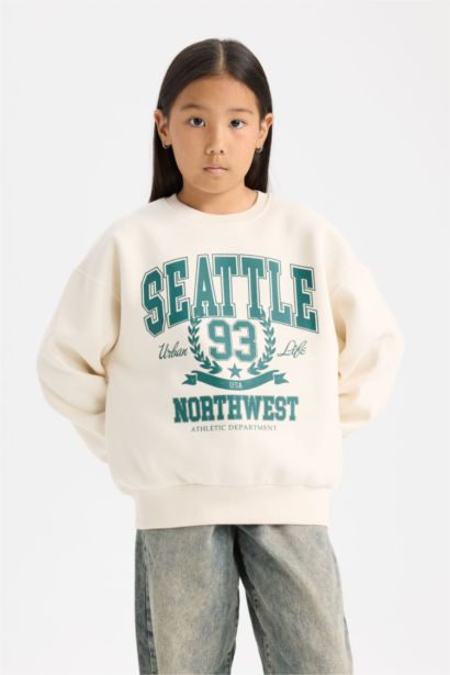 سويت شيرت قصة مريحة بياخة مستديرة