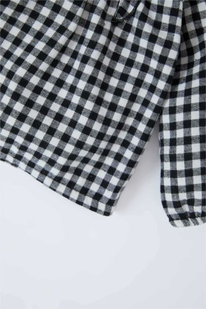 طقم من قطعتين بلوزة كارو برقبة مستديرة و سروال ضيق للبيبي بنت