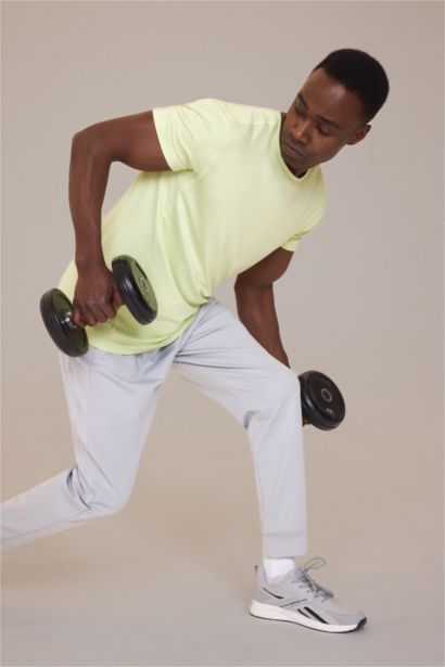 تيشيرت رياضي مطبوع قصة عادية بياخة مستديرة من DeFactoFit