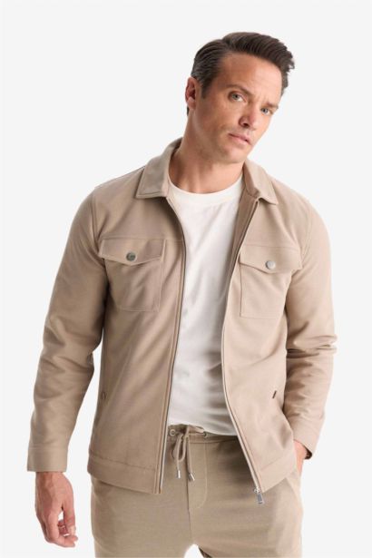 Veste slim à col polo et fermeture zip