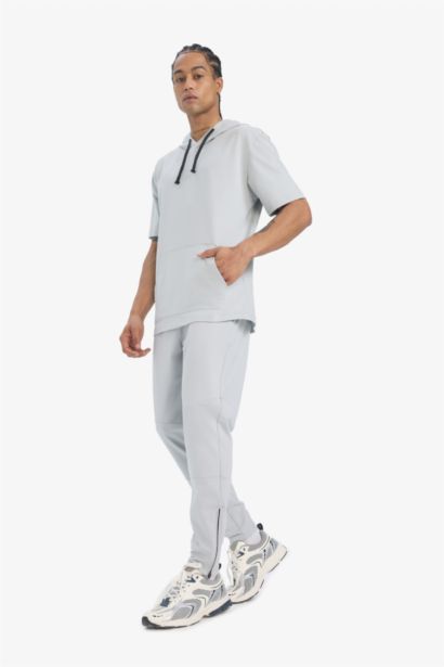 تيشيرت رياضي قصة عادية مطبوع بكابيشون من DeFactoFit