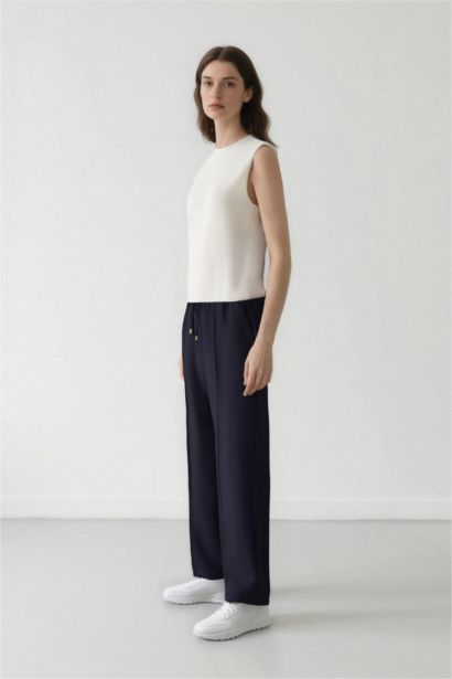 بنطلون قصة مستقيمة واسعة بجيب وخصر مطاطي